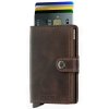 Peňaženka SECRID Miniwallet Vintage Chocolate - Inovatívna peňaženka najmodernejšieho strihu s možnosťou personifikácie laserovým gravírovaním. Tovar na sklade, vrátane rytia expedujeme do 48h.